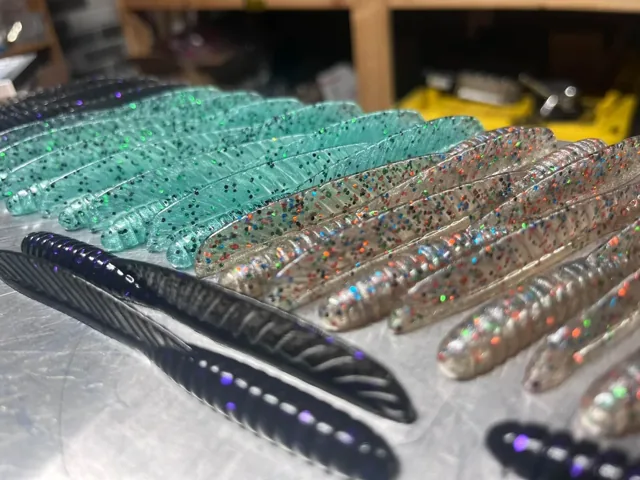 Several finished soft plastic profiles and colors on a tray